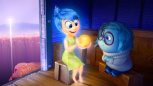 Joy (voice of Amy Poehler) and Sadness (voice of Phyllis Smith) catch a ride on the Train of Thought in DisneyPixar's "Inside Out." Directed by Pete Docter (Monsters, Inc., Up), "Inside Out" opens in theaters nationwide June 19, 2015. ©2014 DisneyPixar. All Rights Reserved.